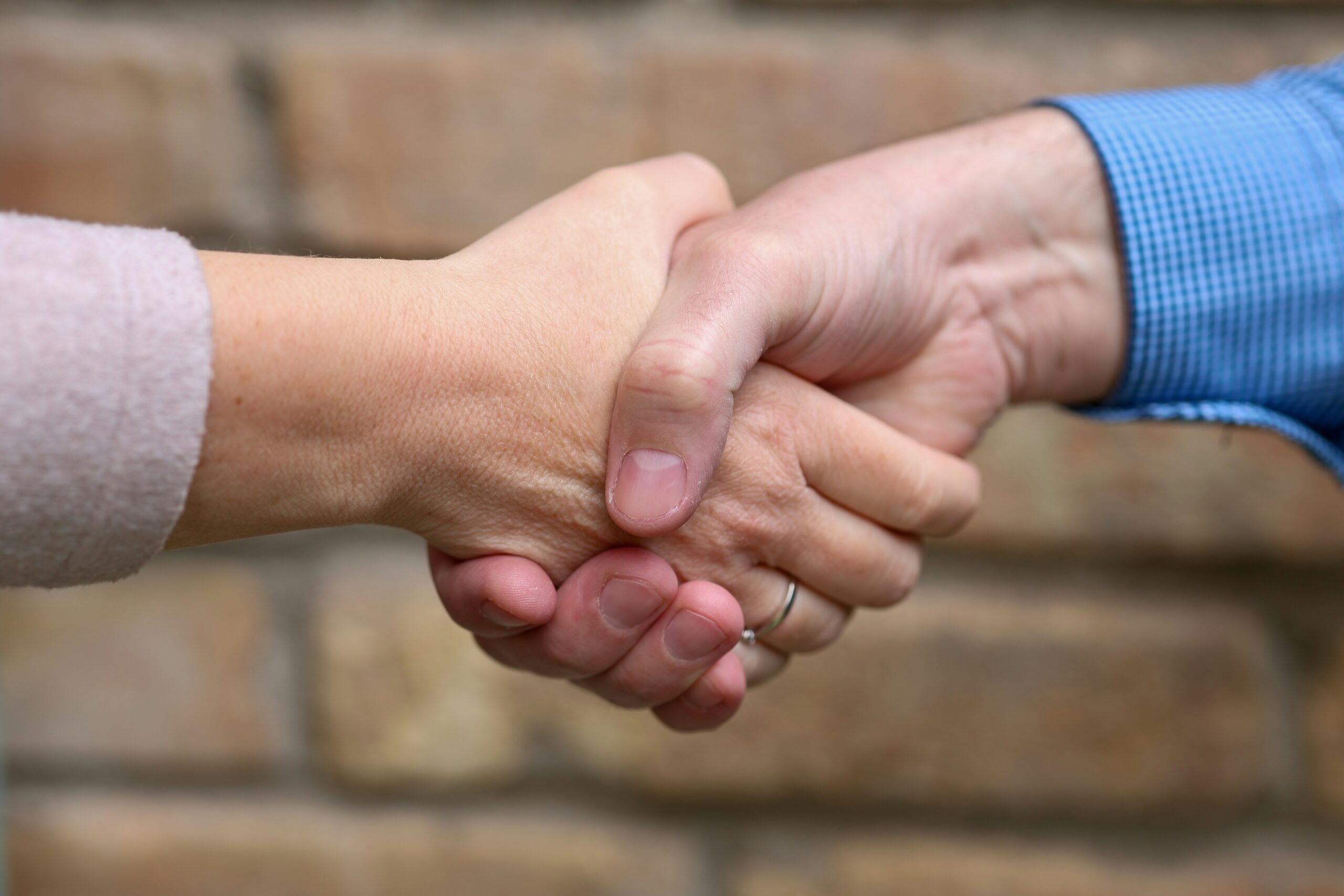 Two people shaking hands
